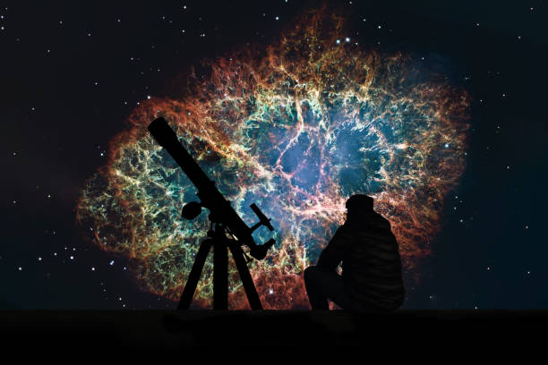 istock Man with telescope looking at the stars. Crab Nebula in constellation Taurus. Supernova Core pulsar neutron star. 824706146