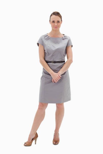 istock Woman in dress holding her hands 824709574