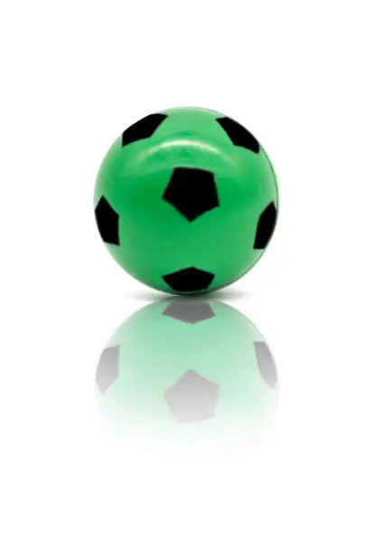 Photo of low quality print green football or soccer ball  isolated on white background