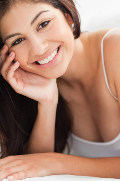 istock Close up Woman with a hand on her cheek 824727278