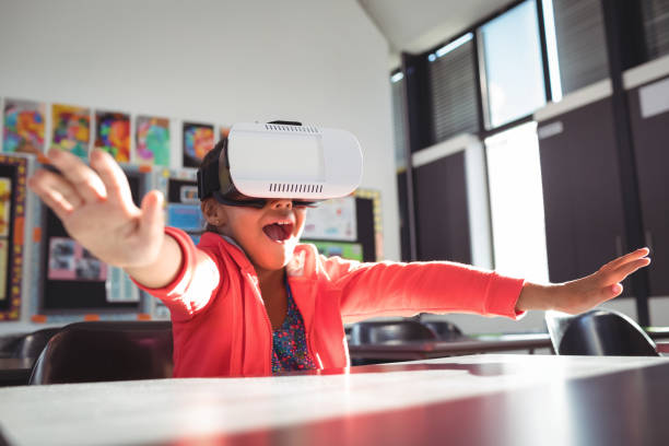 istock Girl with mouth open using virtual reality glasses 824730336