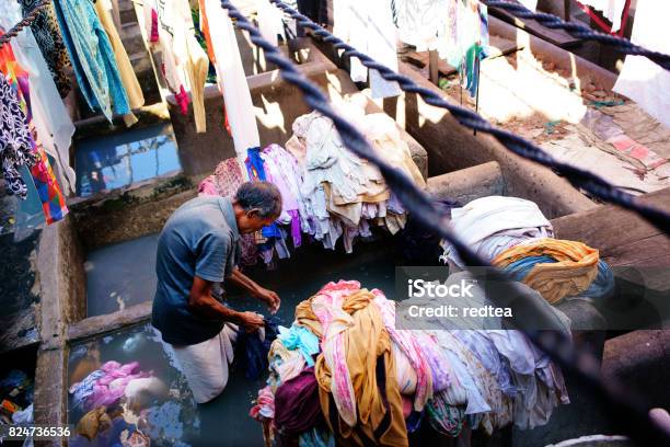 Indian Workers Washing Clothes At Dhobi Ghat In Mumbai India Stock Photo - Download Image Now