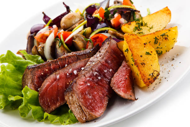 istock Grilled beefsteak with baked potatoes 824741294