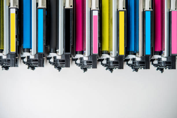 laser toner cartridge row of used laser toner cartridge cartridge stock pictures, royalty-free photos & images