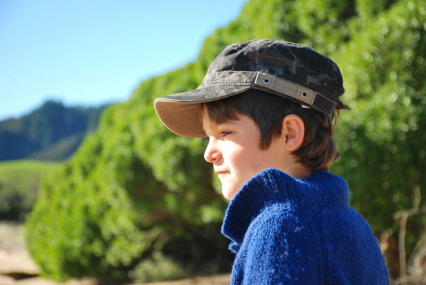 istock Child in Rural Scene in Winter Sun 824750098