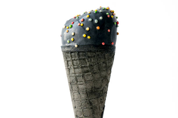 istock Isolated black ice cream with colored sprinkles 824753238