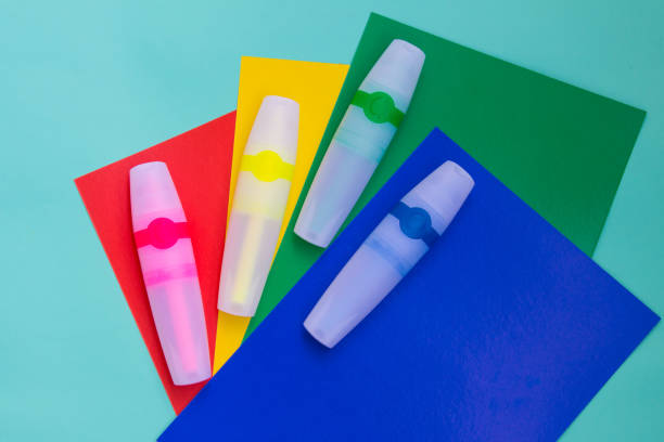 istock Bright colored markers or felt pen are located on sheets of colored paper. 824753300