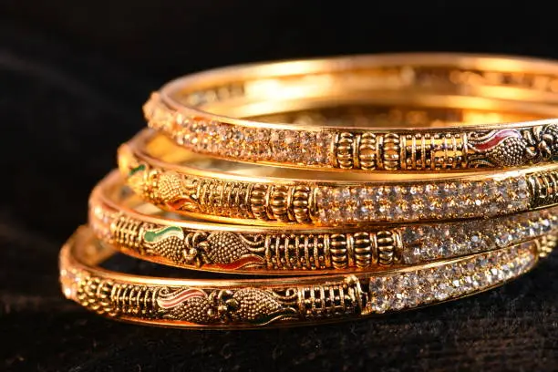 Fancy Golden bangles for woman fashion jewelary photography macro image