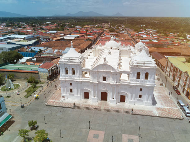 istock White church in Leon on volcano background 824754212