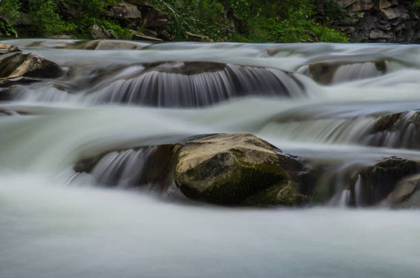 istock background landscape with waterfall in Yaremche vilage in Ukraine 824781020