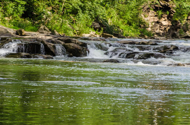 istock background landscape with waterfall in Yaremche vilage in Ukraine 824781302