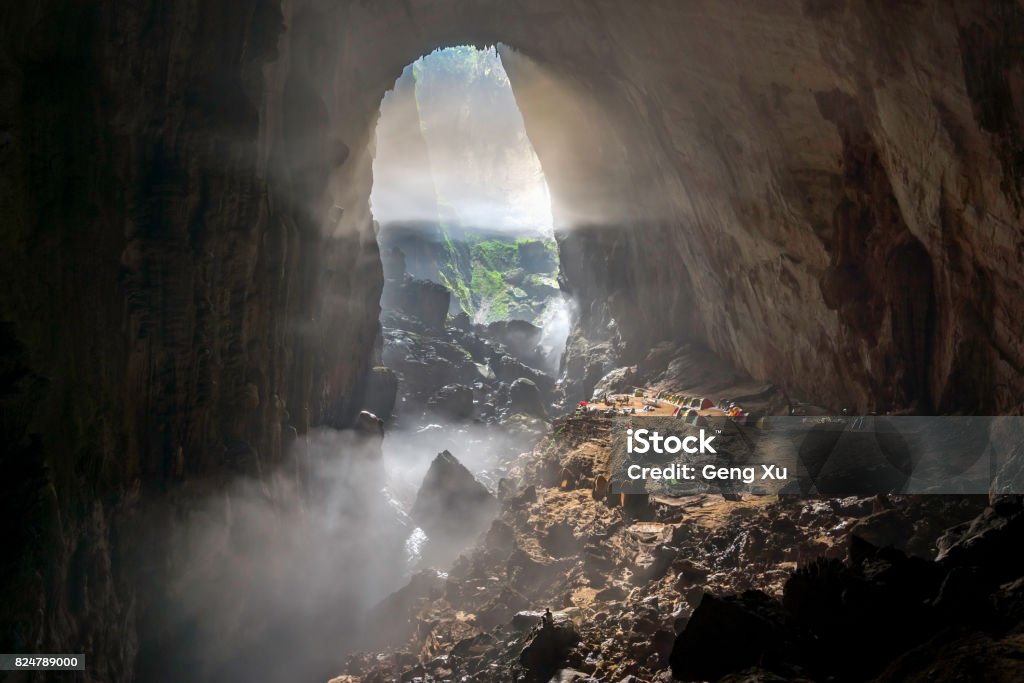 World's Largest Cave - Han Son Doong The world's biggest cave Hang Son Doong is located in the heart of the Phong Nha-Ke Bang National Park in Vietnam. It stretches more than 5 kilometers long with the height of nearly 200 meters. Sơn Đoòng Cave Stock Photo