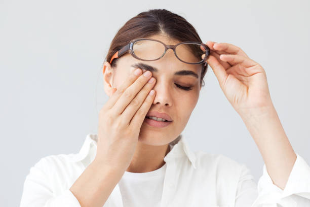 istock Young woman with eye fatigue 824797266