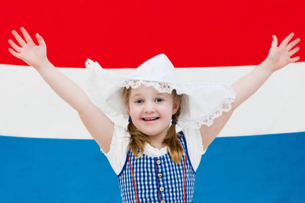 istock Dutch child with flag of Netherlands 824797720