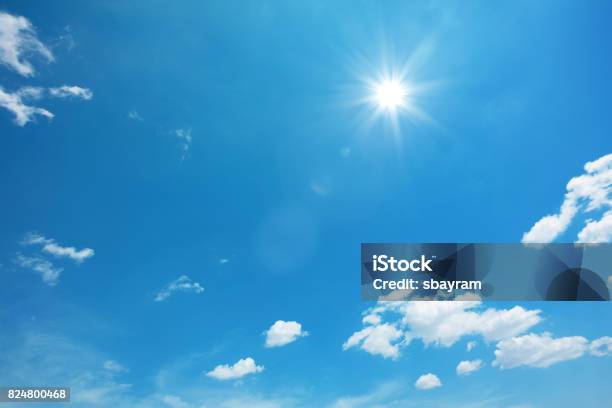 Sun On Blue Sky With Clouds Stock Photo - Download Image Now - Sky, Sun, Blue