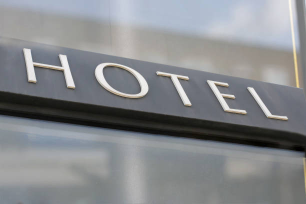 istock Glass facade with hotel inscription 824803946