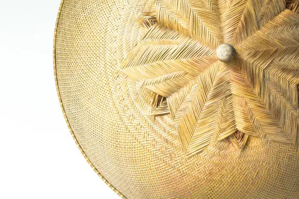 A dish cover made of bamboo strips woven into a pattern and shaped in a half-sphere. This basketry covers plates of a set of one meal. Once not in use, the dish cover is hung onto the wall as a home decor.