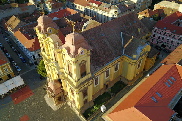 Monument and St. Michael church in old town Osijek, Croatia.