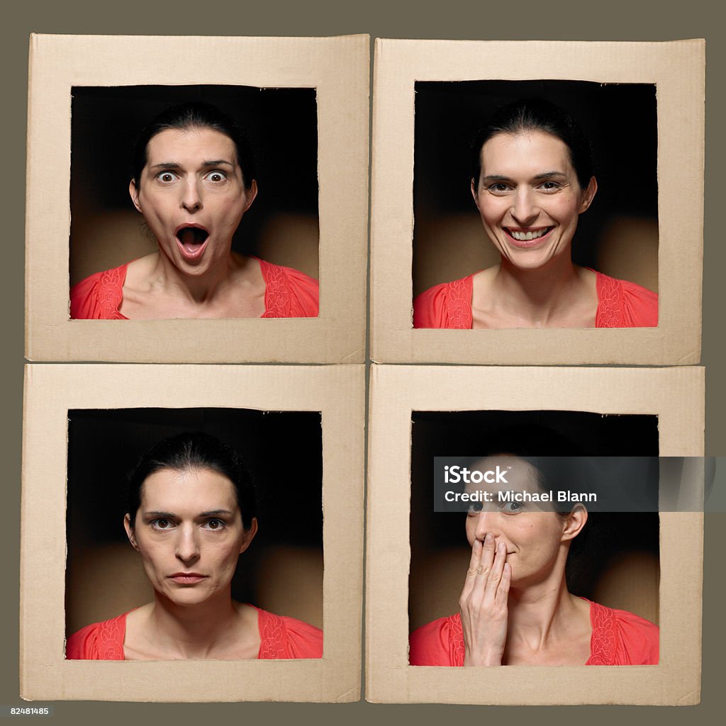Mujer con la cabeza en cajas extracción de caras - Foto de stock de Cara humana libre de derechos
