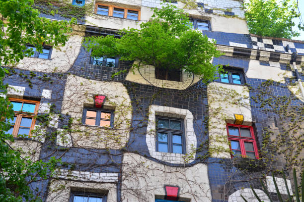 hundertwasserhaus, vienna Vienna, Austria - April 27, 2015: Facade detail of the famous Hundertwasserhaus in Vienna, Austria. Shot taken on April 27th, 2015 hundertwasser house stock pictures, royalty-free photos & images