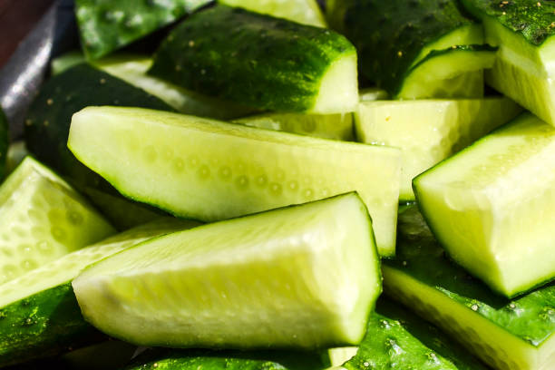 istock Pile of ripe sliced cucumber 824820110