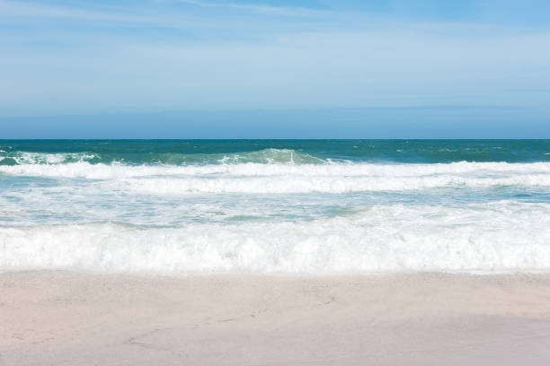 istock Sea view from tropical beach with sunny sky 824820676