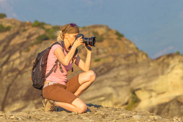 istock Nature woman photographer 824823776