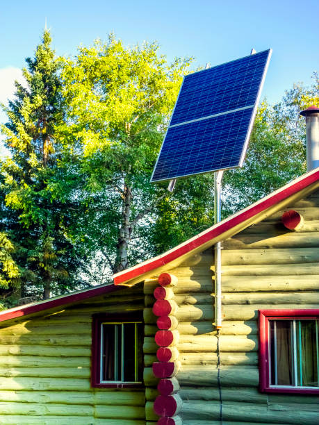 Solar panels On the roof of a chalet a solar panel is installed. lotissement stock pictures, royalty-free photos & images