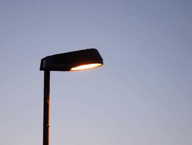istock street lamp over blue sky 824828140