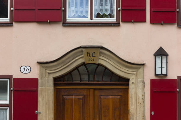 in a historical city of bavaria in south germany at summertime old wooden timber frame buildings with windows, doors and deecorations are a romantical place to have holiday of even relaxing time