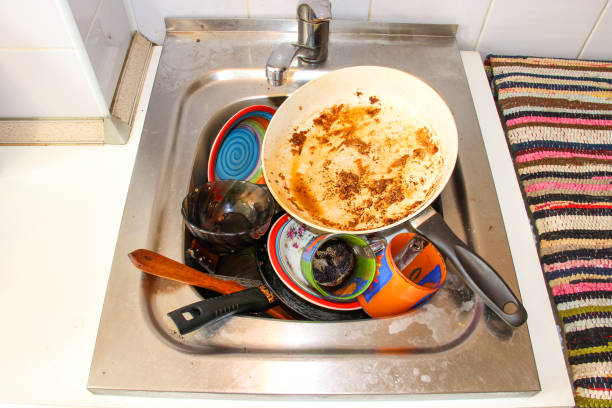 istock Dirty dishes in the sink, in the kitchen 824835698