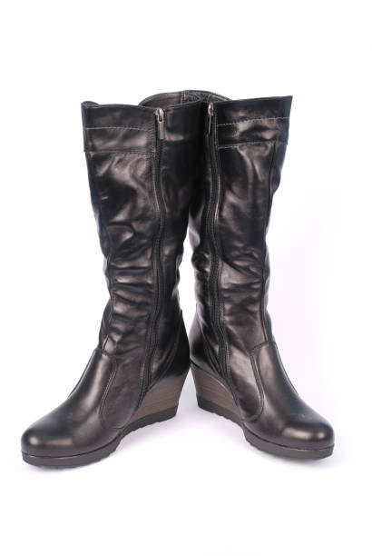 istock A pair of black leather women's boots 824841012