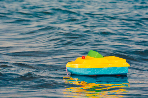istock Toy Boat in the Sea 824844732
