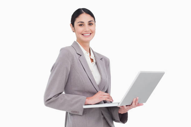 istock Smiling businesswoman with her laptop 824852896
