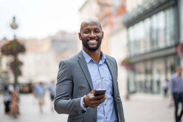 istock Businessman looking navigation on smart phone 824863874