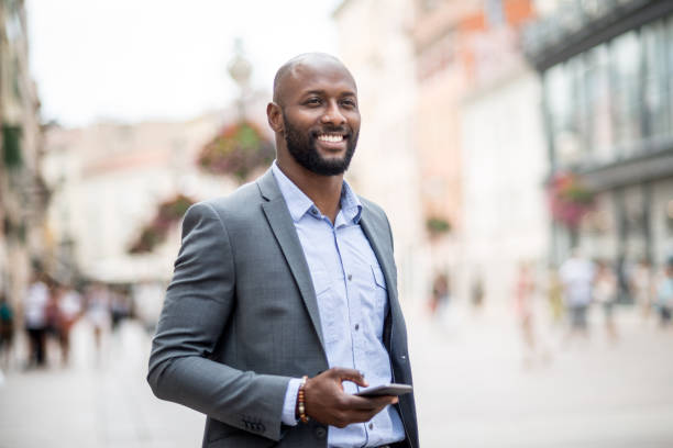 istock Businessman looking navigation on smart phone 824863888