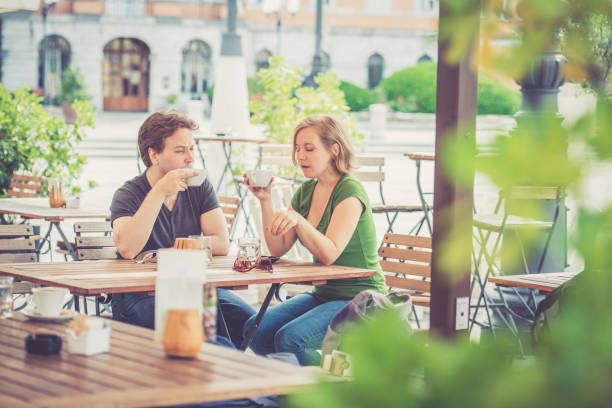 istock Couple drinking italian cappuccino 824864894