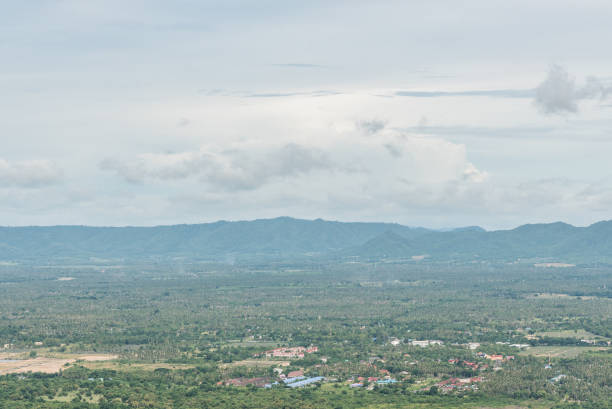 istock Countryside area with mountain and cloudy sky on background. 824864990