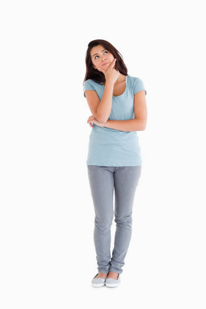 istock Beautiful pensive woman standing 824867792