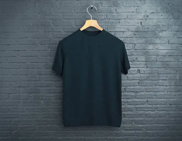 Photo of Black t-shirt on brick background