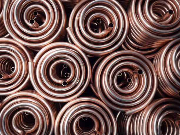Heat exchangers obtained by wrapping copper tube. Heat exchangers obtained by winding copper pipe. copper mine photos stock pictures, royalty-free photos & images