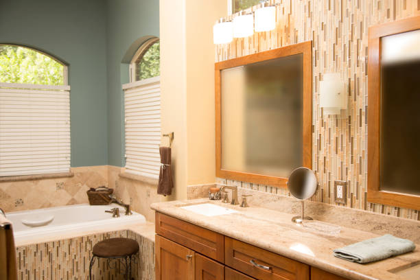 istock Upscale home master bathroom with counter area and bathtub. 824880078