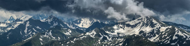 istock Greater Caucasus Mountain Range. Mountain peaks covered by snow. 824880138