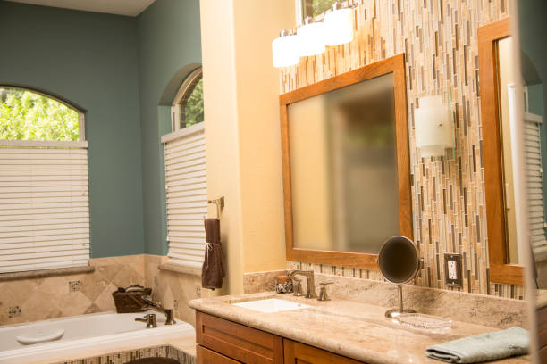 istock Upscale home master bathroom with counter area and bathtub. 824880536