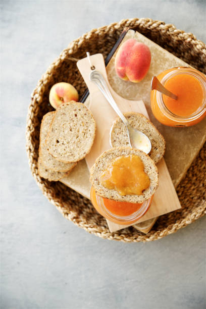 istock Toast with apricot or peach jam on tray 824886430