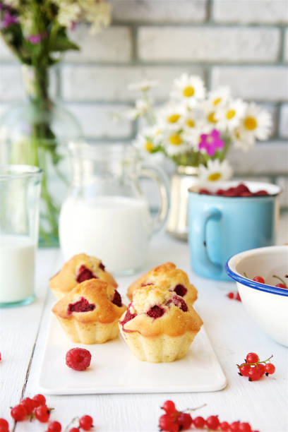 istock Morning breakfast with muffins, milk and berries 824886696