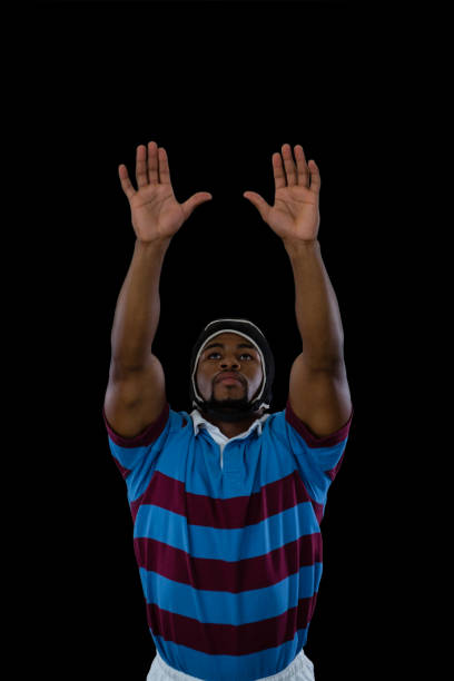 istock Sportsman with arms raised playing rugby 824893342