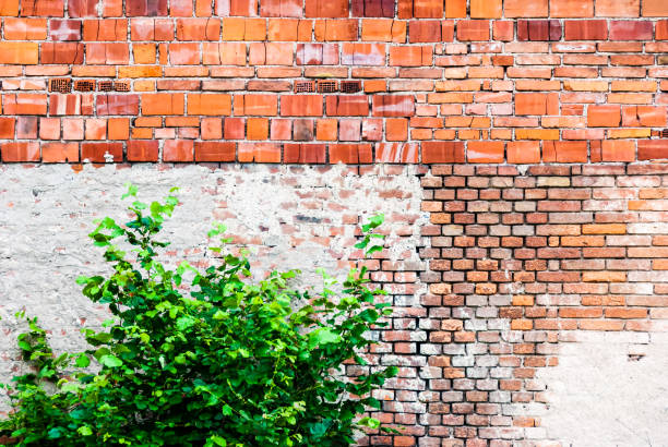 istock Orange dirty wall made of bricks 824893802