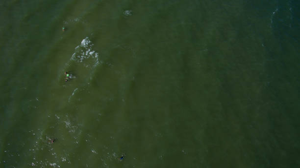 istock People are resting on the sea 824900040