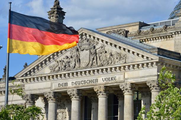 istock German Reichstag and flag 824900700